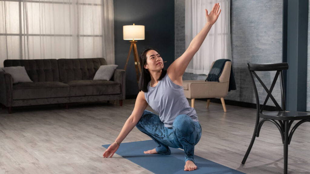 Wellbeats instructor Jessica W. leads a morning yoga routine.